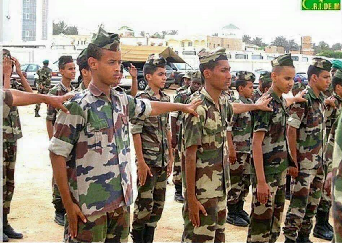Une image contenant uniforme militaire, groupe
Description générée automatiquement